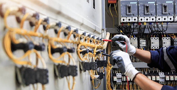 Professional Electrician technician working in Washington Mills, NY